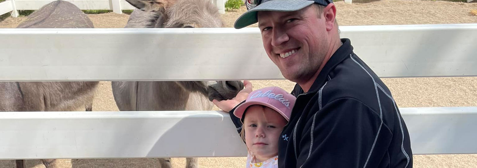 Dadandbabypettingdonkey